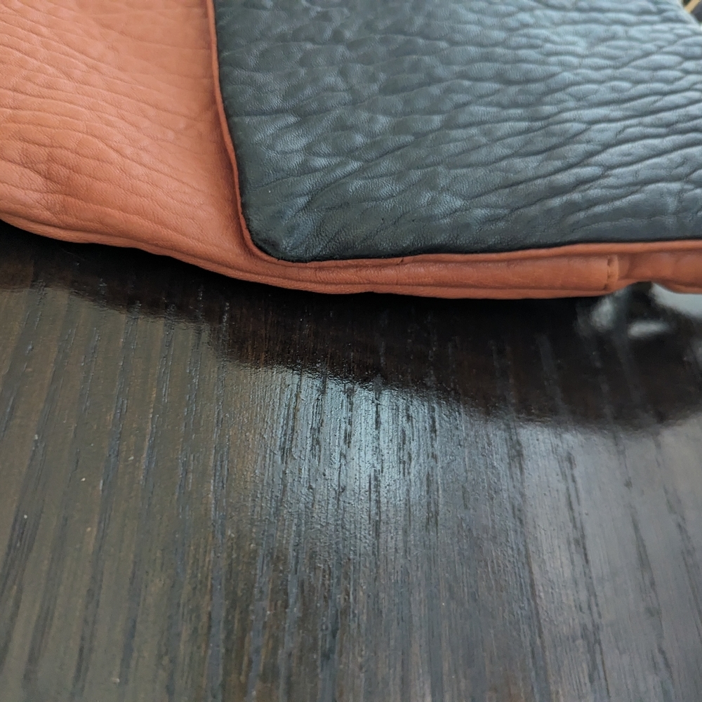 Camel brown, black and gold Alexis Hudson bag.